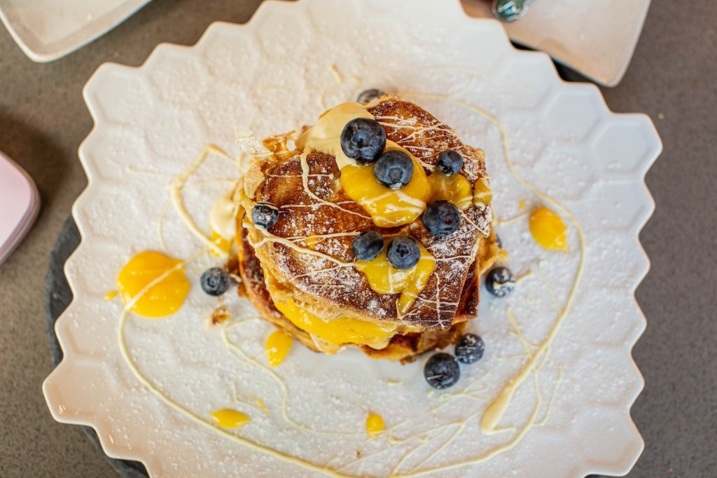 Lemon & blueberry pancake stack aerial view